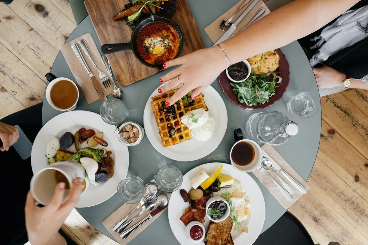 Breakfast plates and coffee on a round table